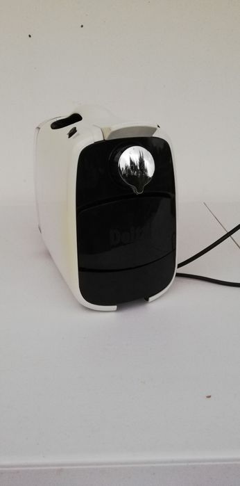 Máquina café cápsulas Delta