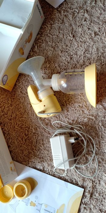 Молокоотсос MEDELA электрический