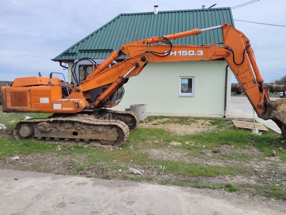 Екскаватор гусеничний