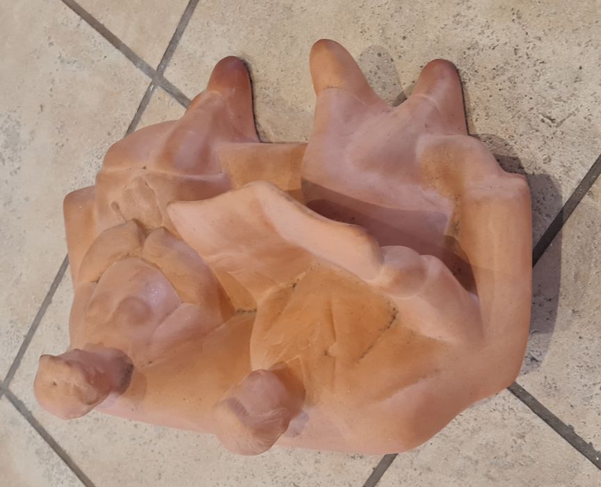 Estatueta decorativa em barro natural