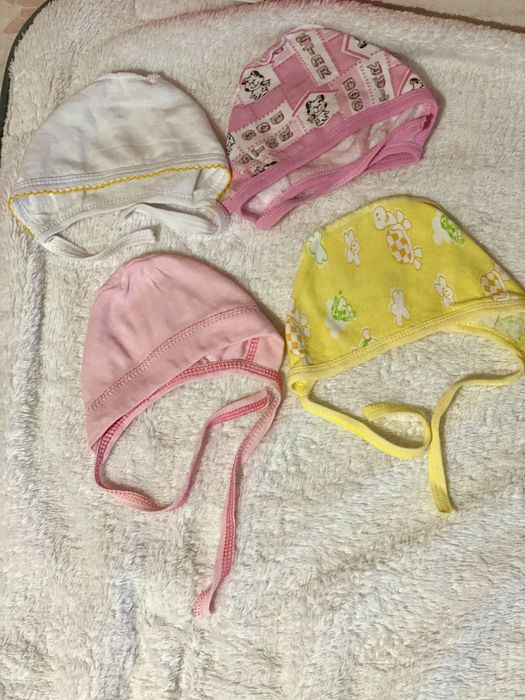 Продам шапочки для новонароджених теплі на завязках