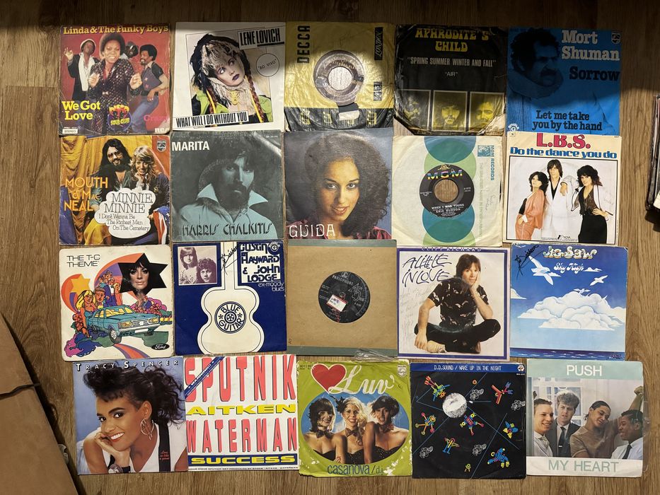 Lote 100 discos de vinil 45 RpM