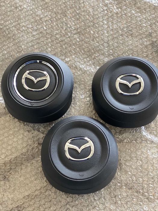 Кришки на руль Mazda