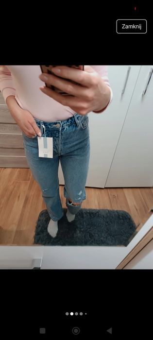 Spodnie jeansowe z dziurami
