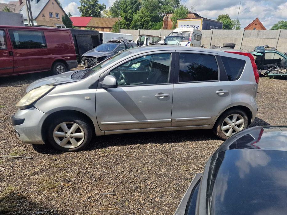 ćwiartka błotnik tył lewa nissan note e11 1.6 lak KY0