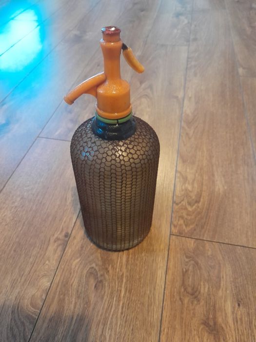 Syfon saturator w metalowym oplocie PRL Wysyłka merkuria