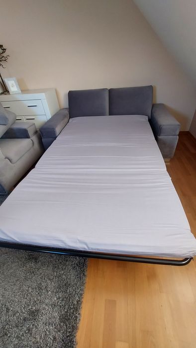 Szary komplet wypoczynkowy z funkcją spania