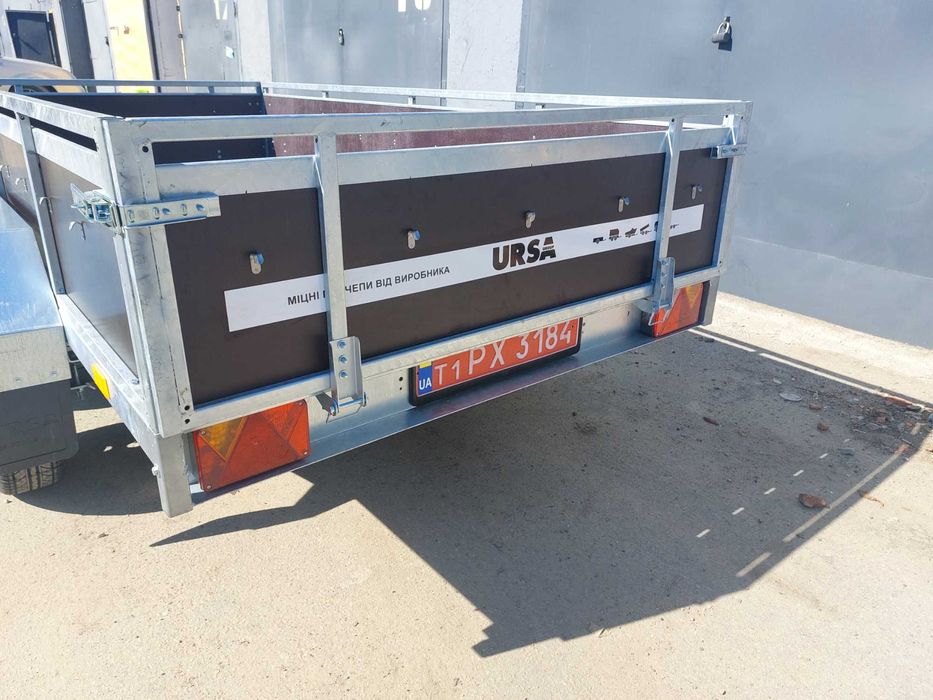 Прицеп легковий двохосьний