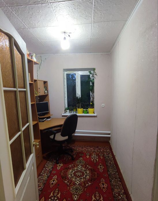 Продам в Харківській  обл, м.Балаклії 1/2 частку часного будинка