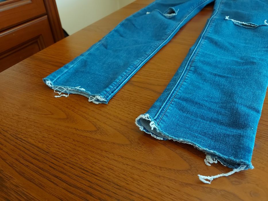 Jeansy z rozdarciami Sinsay Denim collection rozm. 36