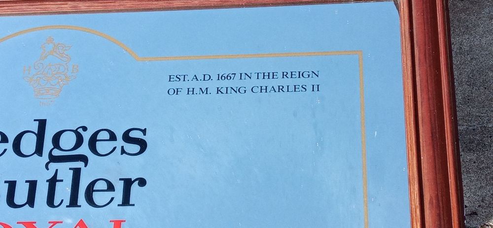 Espelho publicitário de whisky
