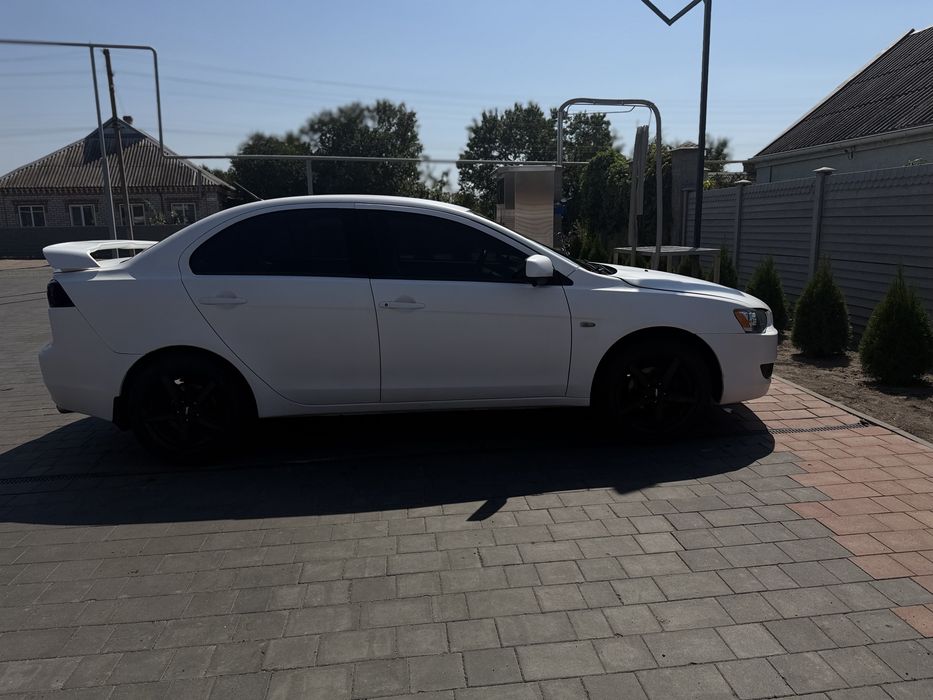 Mitsubishi Lancer 2012 VIN JMBSRCY1ACU005601 фото оголошення 6 з 19