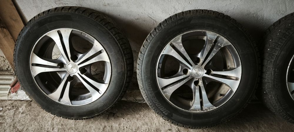 Комплект шини Bridgestone Ice Cruiser + диски титанові