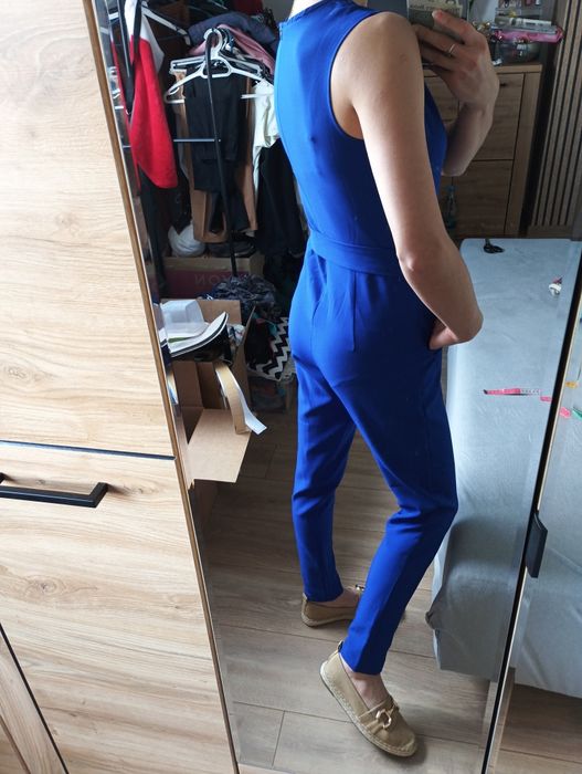 Zadbany granatowy kombinezon rozmiar S