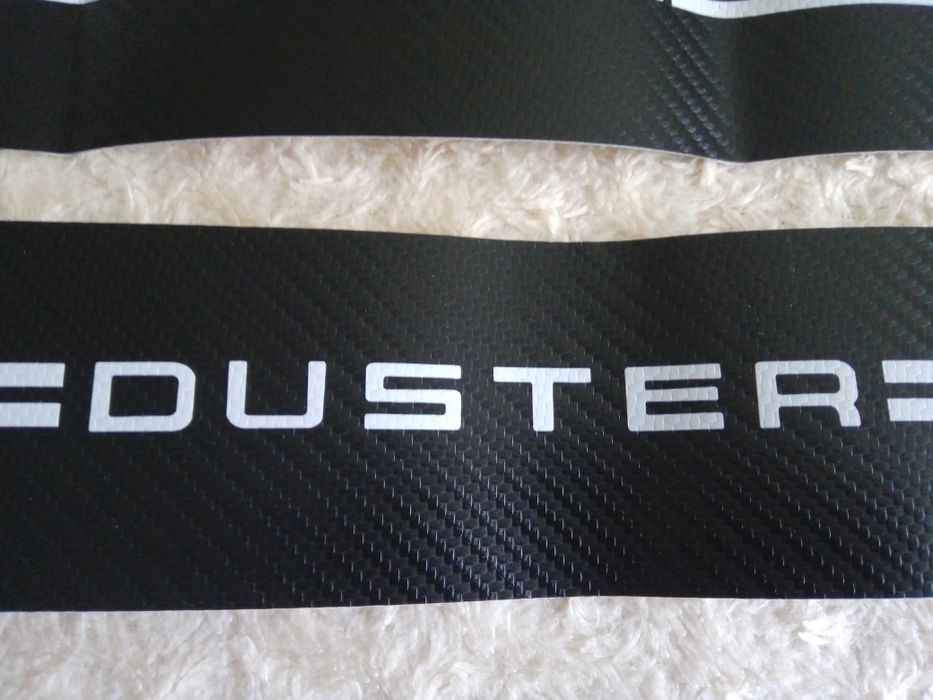 Наклейки на пороги RENAULT DUSTER