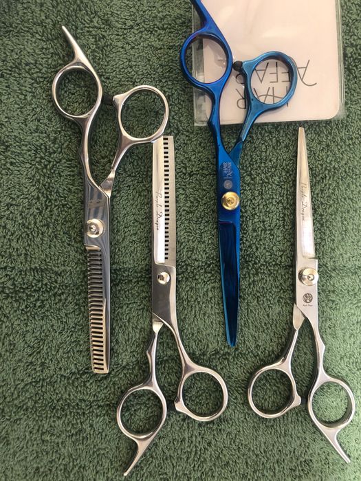 Новые парикмахерские ножницы для  волос.