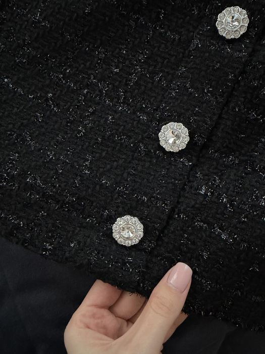 Твідова спідниця