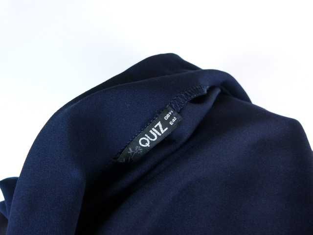 Quiz elegancki kombinezon 14 / 40