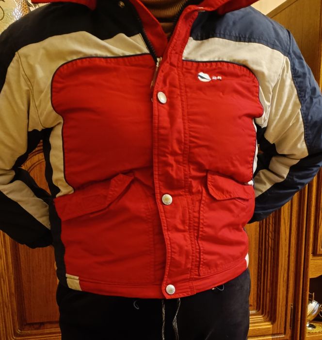 Tanio zimowa ciepła dziecięca kurtka firmy Brugi