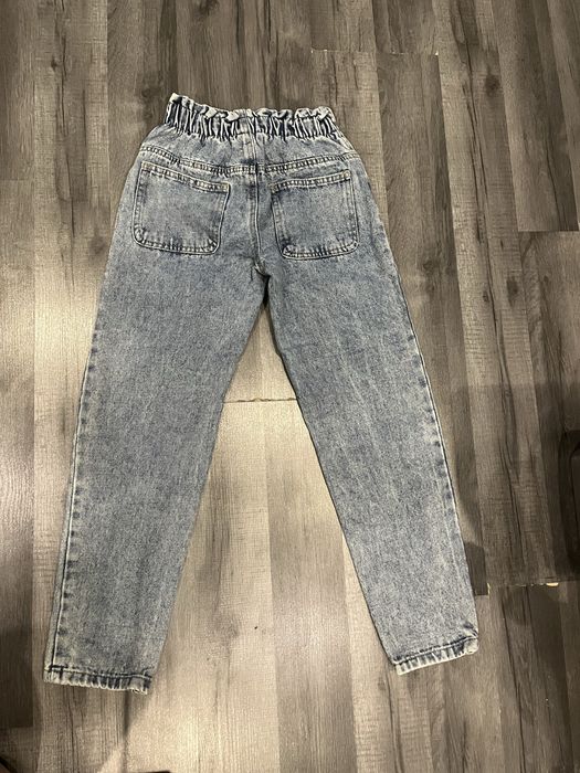 Spodnie jeansy 128/134
