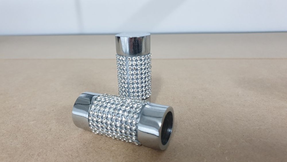 Pontas de varão para cortinados