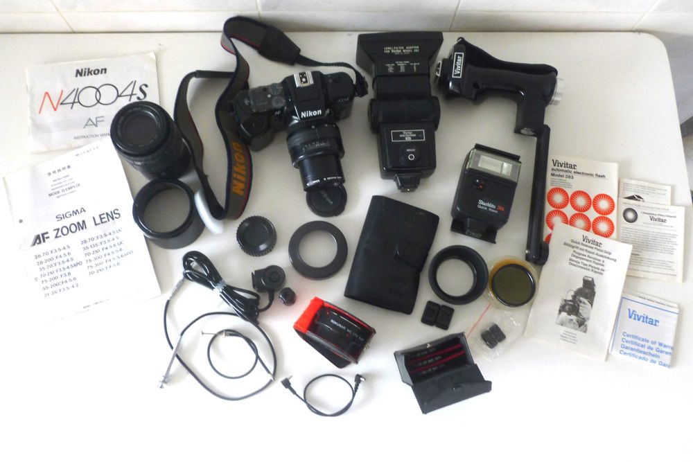 Nikon N4004s, 2 Sigma object teleconversor 2 Flash Vivitar, lentes +