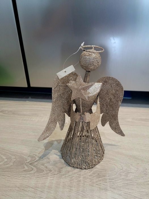 Metalowy anioł z brokatem