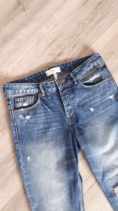 Jeansy z dziurami Mango Rachel 36/38