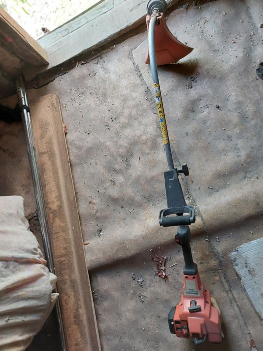 Продам бензо тример,Husqvarna 24c.