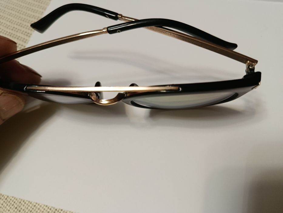 Окуляри сонцезахисні. Оригінальні