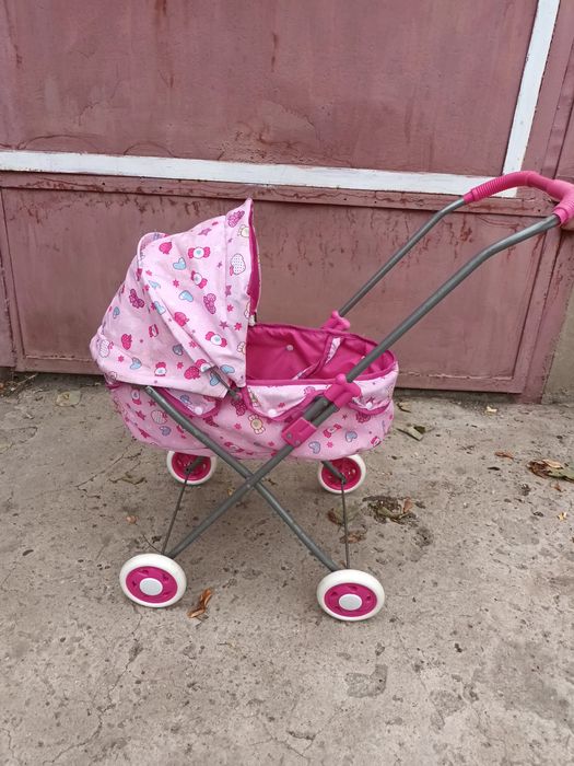 Дитяча коляска іграшка