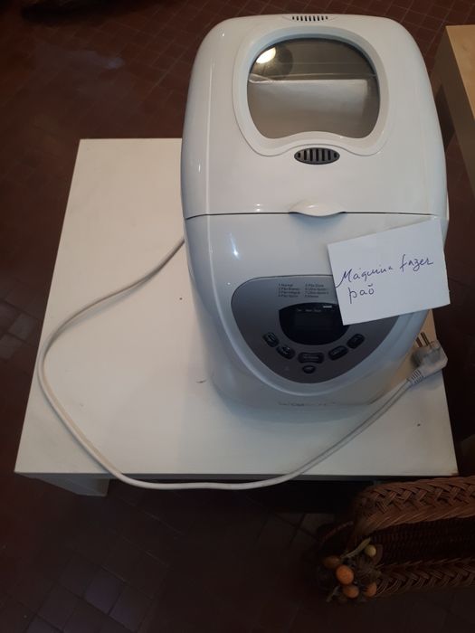 Maquina cozer pão .