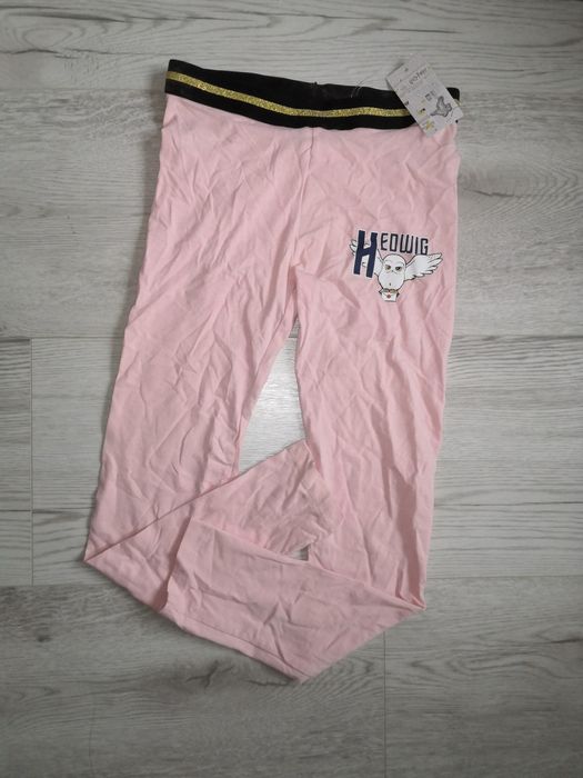Harry Potter różowe legginsy dla dziewczynki sowa hedwiga.