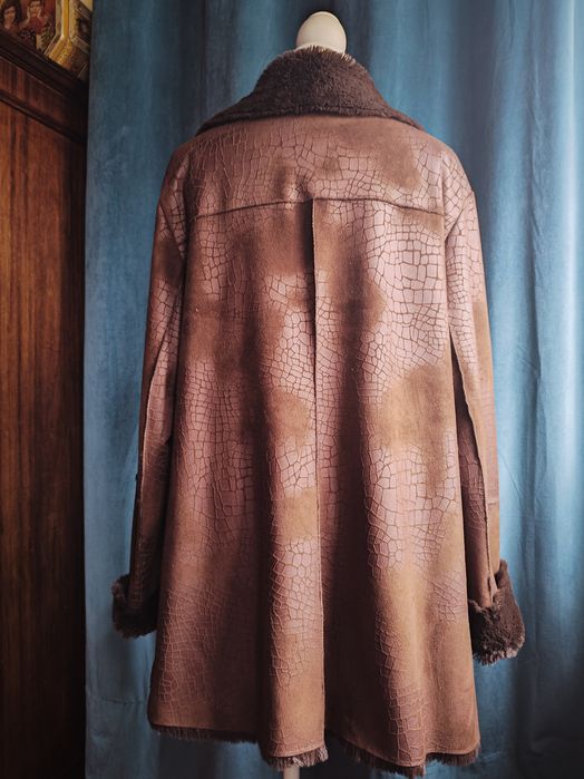 Casaco de imitação de pele