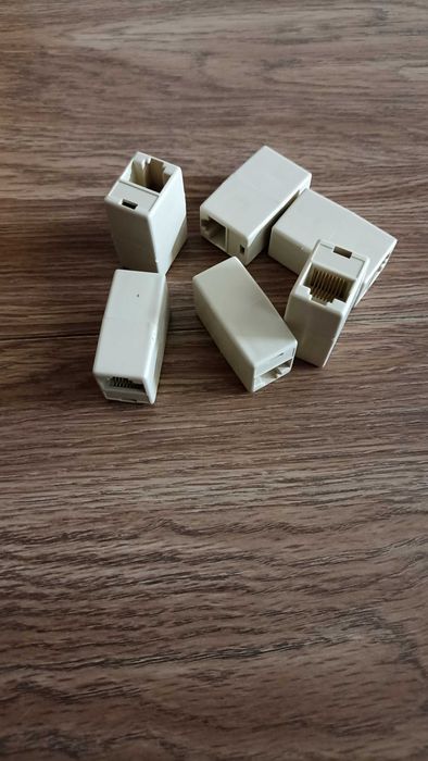 З'єднувач патч-кордів мама/мама Merlion (2xRJ45-GREY/06183)