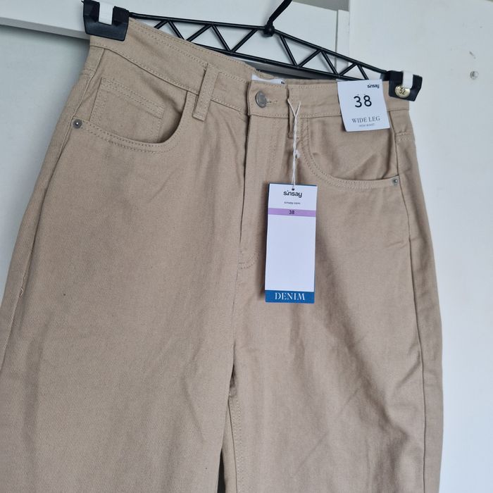 Sinsay bawełniane jeansy beż wild leg