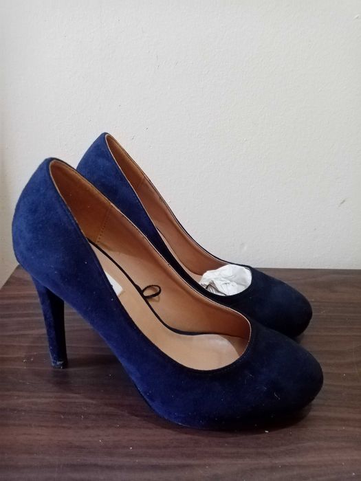 Sapatos seaside como novos