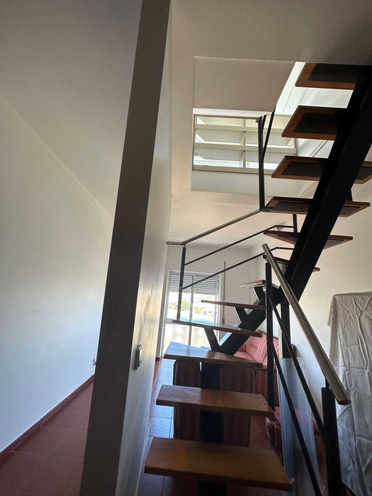 Escada "caracol" interior