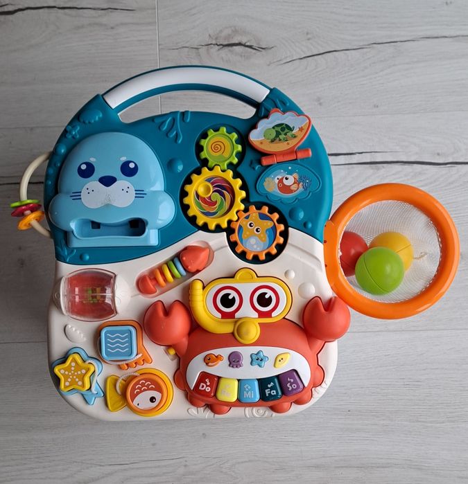 Pchacz i stolik edukacyjny 2w1