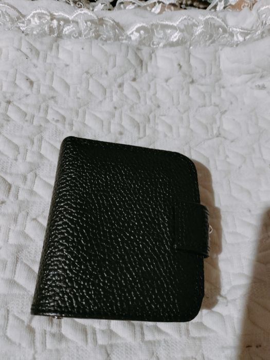 Гаманці та клатчі