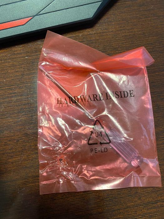 ferramenta nova ainda em saco laranja