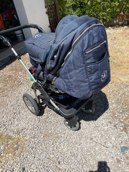 Carrinho de bebé com alcofa