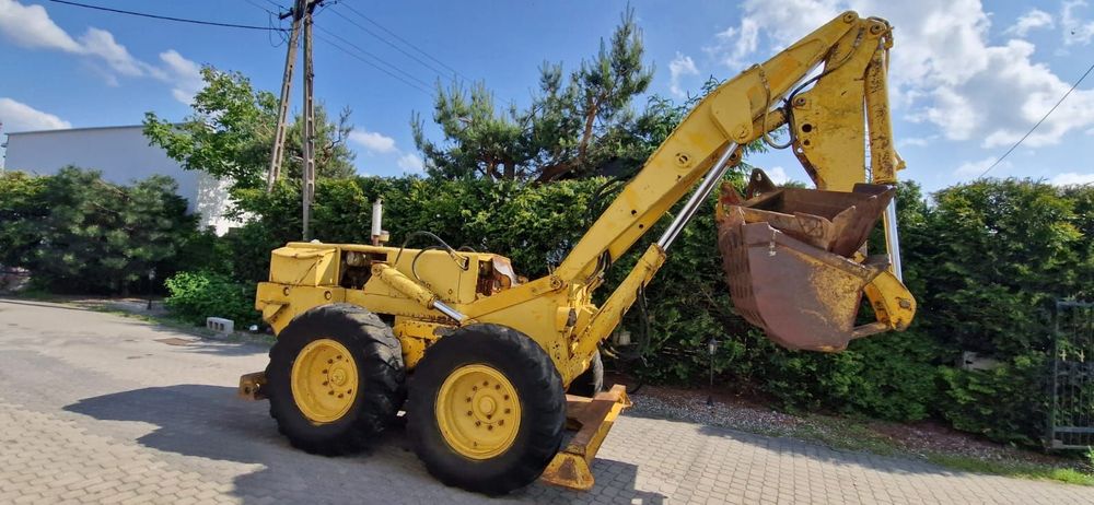 JCB CATERPILLAR PINGON 12A Koparko-ładowarka ROTO Obrotowa 4x4  Koparka kołowa używana