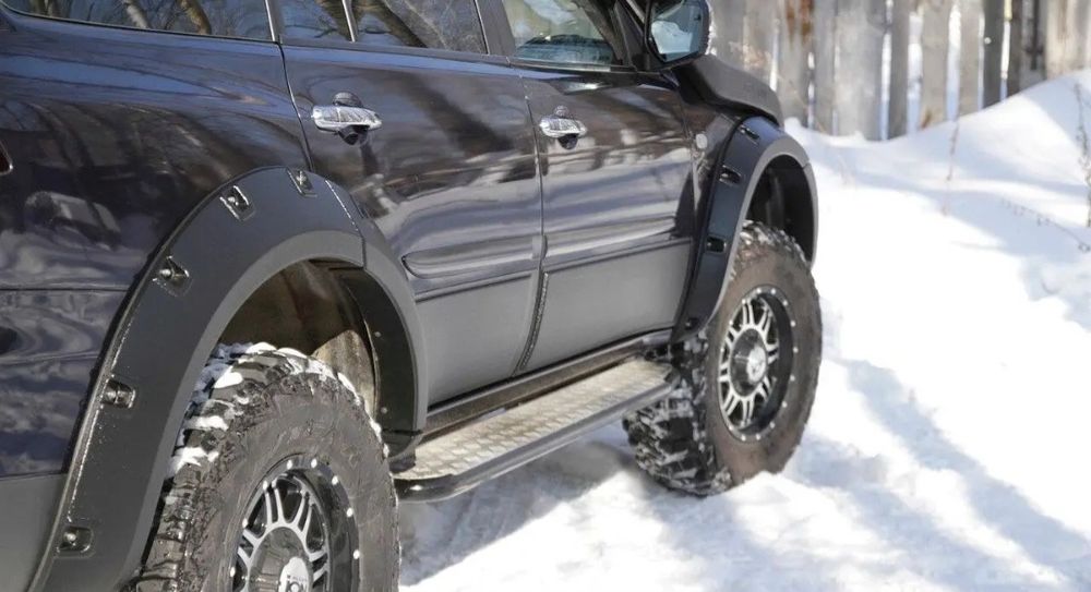 Расширители  колесных арок Mitsubishi Pajero Sport  2008-2013. Лаптеры Митсубиси Паджеро Спорт 2.