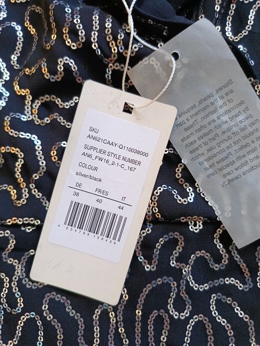 Cekinowa sylwestrowa sukienka