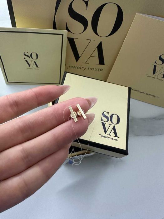 Стильные серьги из красного золота Sova