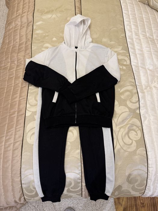 Dres chłopięcy biało-czarny 160 cm