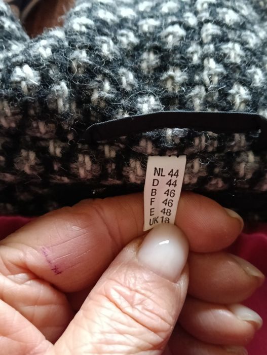 Casaco em preto e cinzento