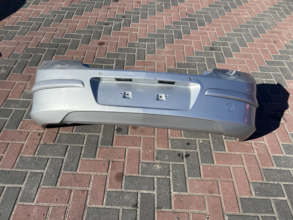 Задній бампер Опель Астра Н