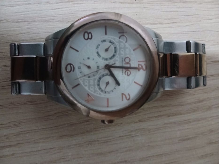 Relógio marca one rosa e prateado de senhora